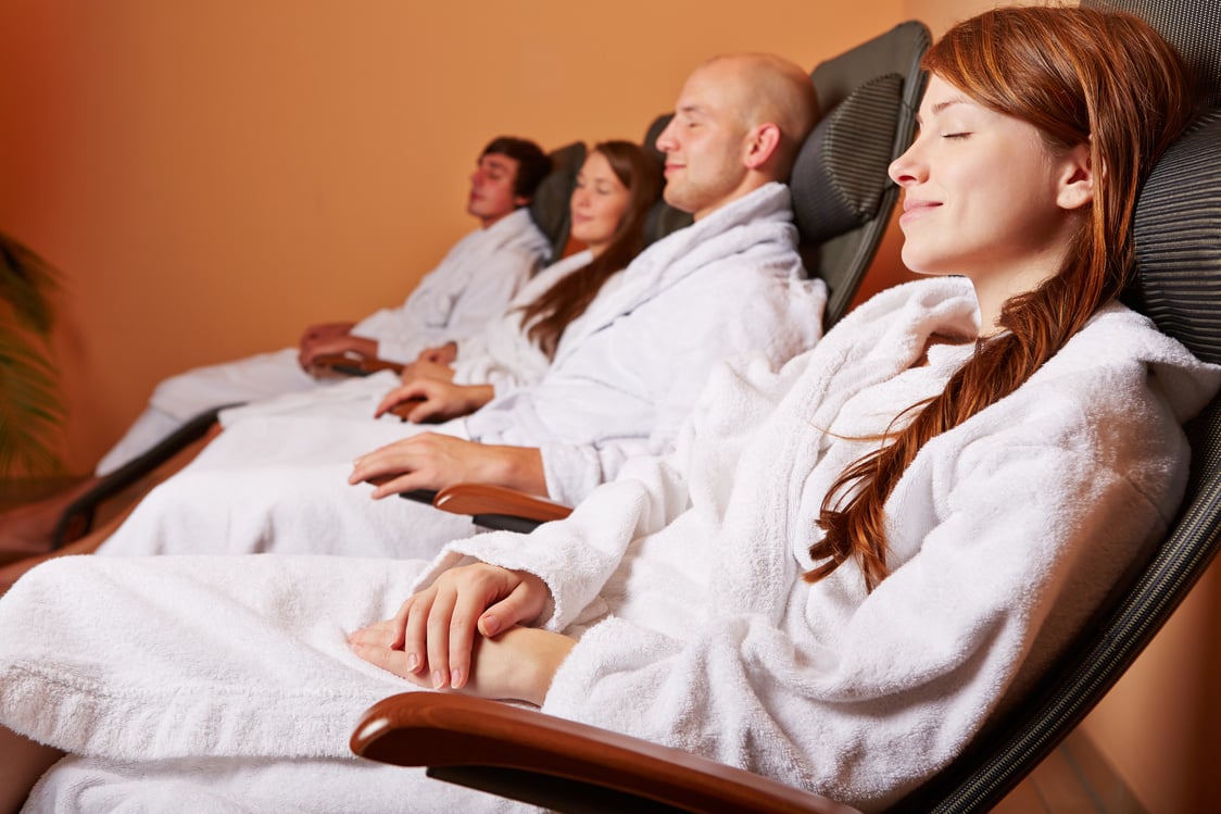 Women and Men in Relaxation Room